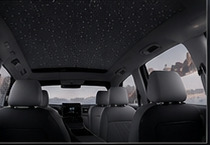 Starlight panoramic roof above the light grey cabin
